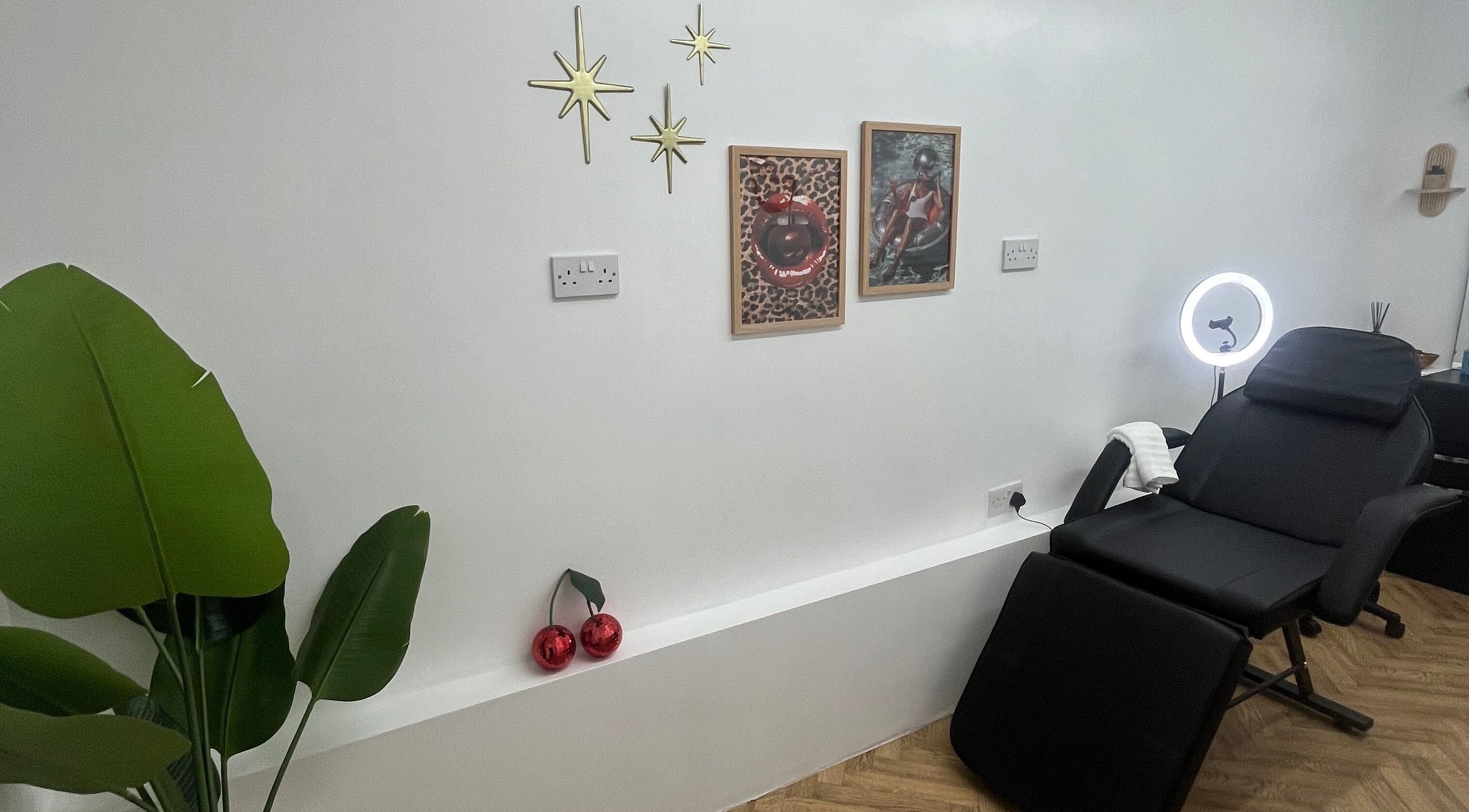 Modern aesthetic room at BABE Aesthetics, Billingham, England, GB, featuring stylish decor and a comfortable treatment chair.