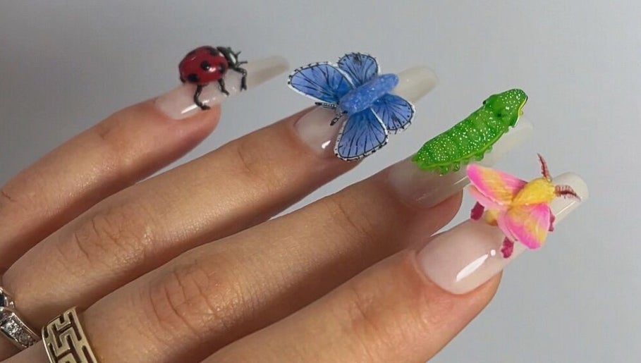 Intricate 3D nail art design at Nailigion, Cluj-napoca, Județul Cluj, RO featuring colorful insects.