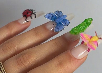 Intricate 3D nail art design at Nailigion, Cluj-napoca, Județul Cluj, RO featuring colorful insects.