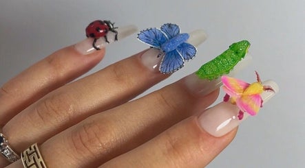 Intricate 3D nail art design at Nailigion, Cluj-napoca, Județul Cluj, RO featuring colorful insects.
