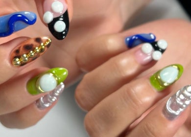 Colorful nail art at Nailigion, Cluj-napoca, Județul Cluj, RO showcases stunning designs and creativity.