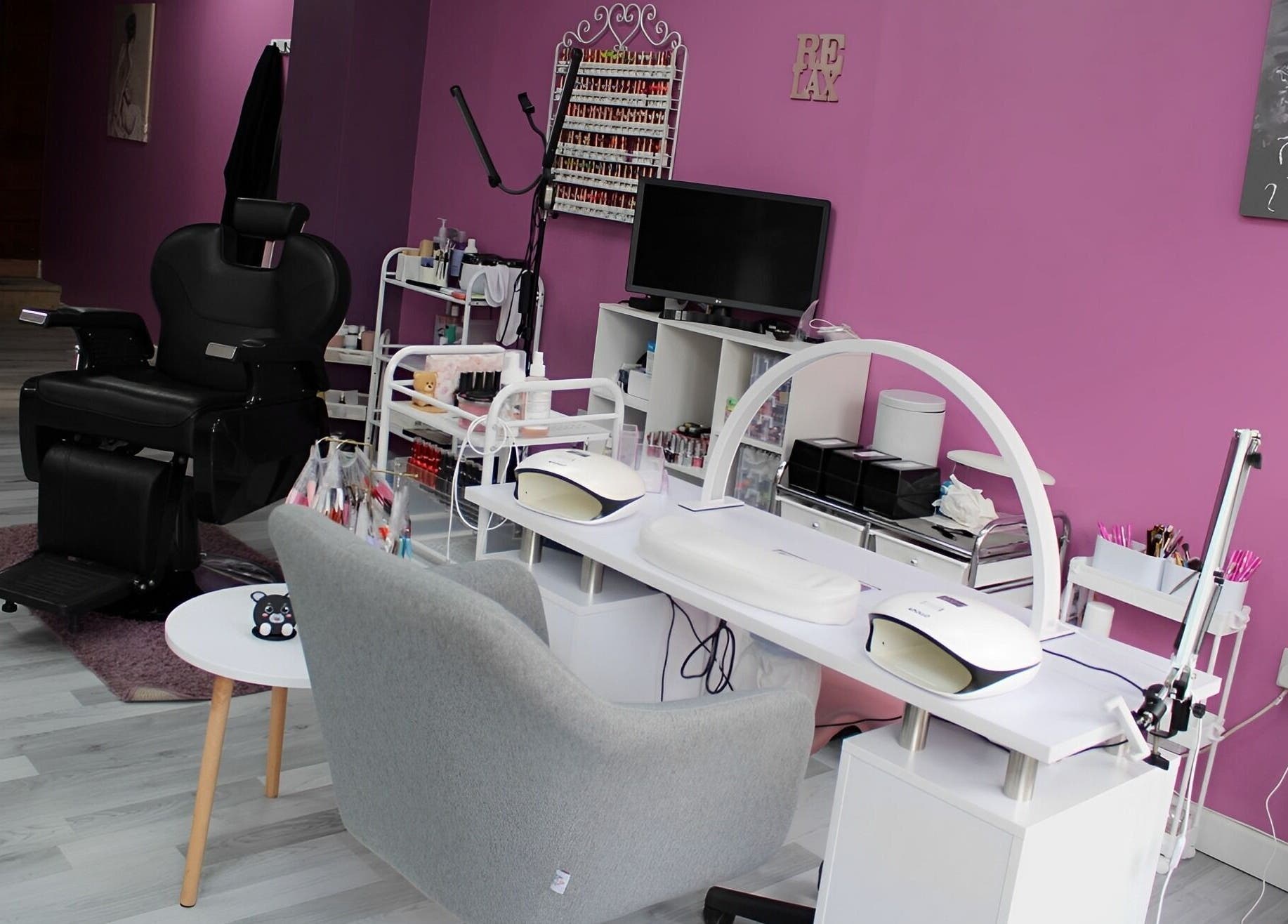 GlamMary beauty salon interior with chic purple walls in Wallsend, England, GB.