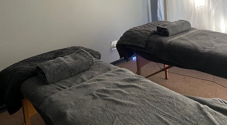 Relaxing massage beds at Serenity Spa in Kuruman, Northern Cape, ZA; perfect for therapeutic wellness experiences.
