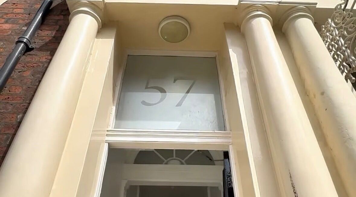 Entrance to Mind and Mane at 57 with elegant columns, located in Liverpool, England, GB.