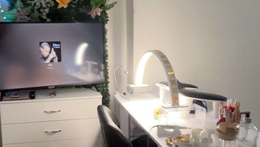 Elegant beauty station at Vibrae, London, England, GB with soft lighting and organized tools.