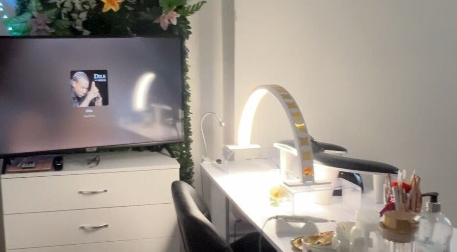 Elegant beauty station at Vibrae, London, England, GB with soft lighting and organized tools.