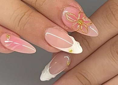Elegant manicured nails with floral design at Vibrae, London, England, GB.