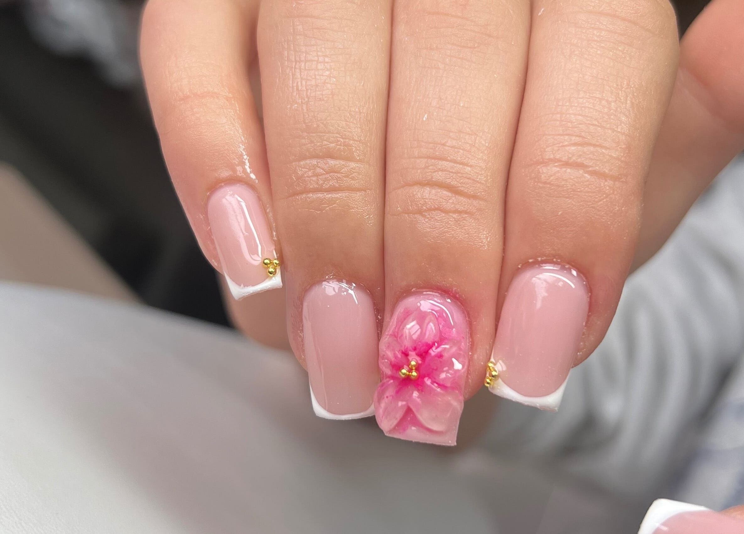 Intricate nail art with pink flower design by Nails by Cat in Cambuslang, Scotland, GB.