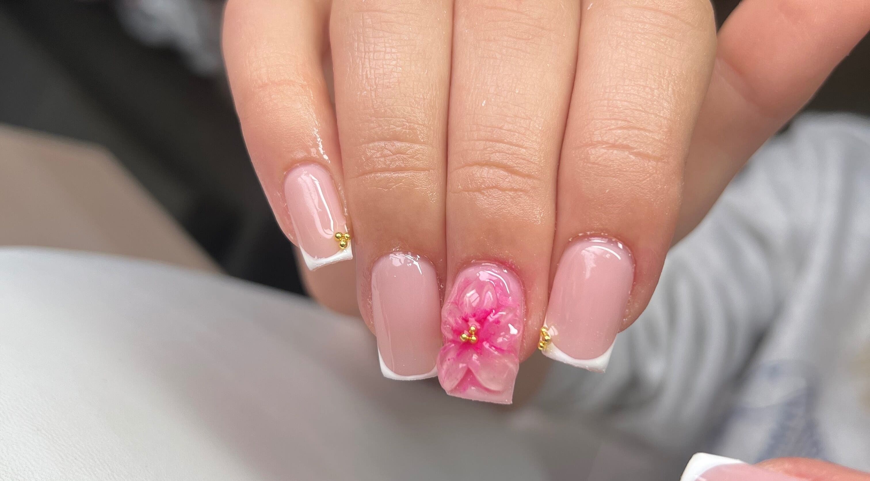 Intricate nail art with pink flower design by Nails by Cat in Cambuslang, Scotland, GB.