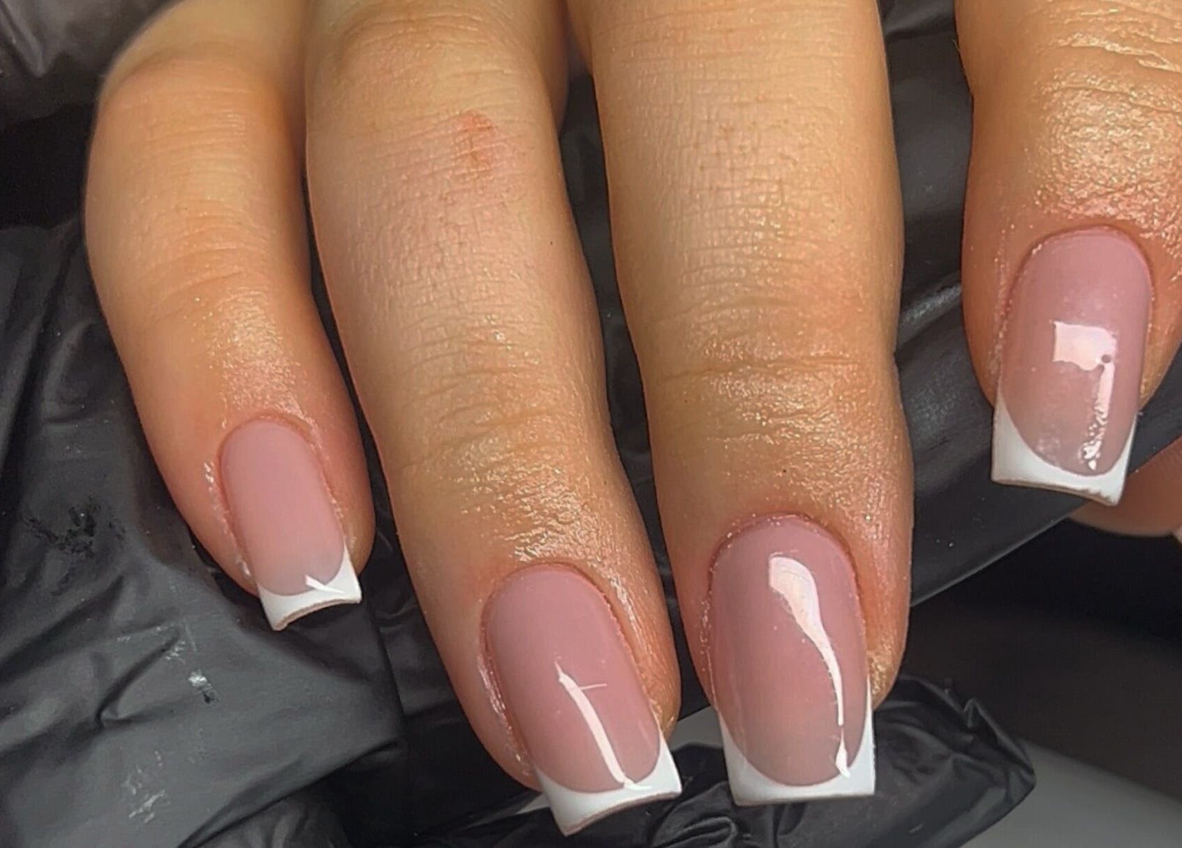 Elegant French manicure nails at Nails by Cat in Cambuslang, Scotland, GB. Glossy finish with classic white tips.