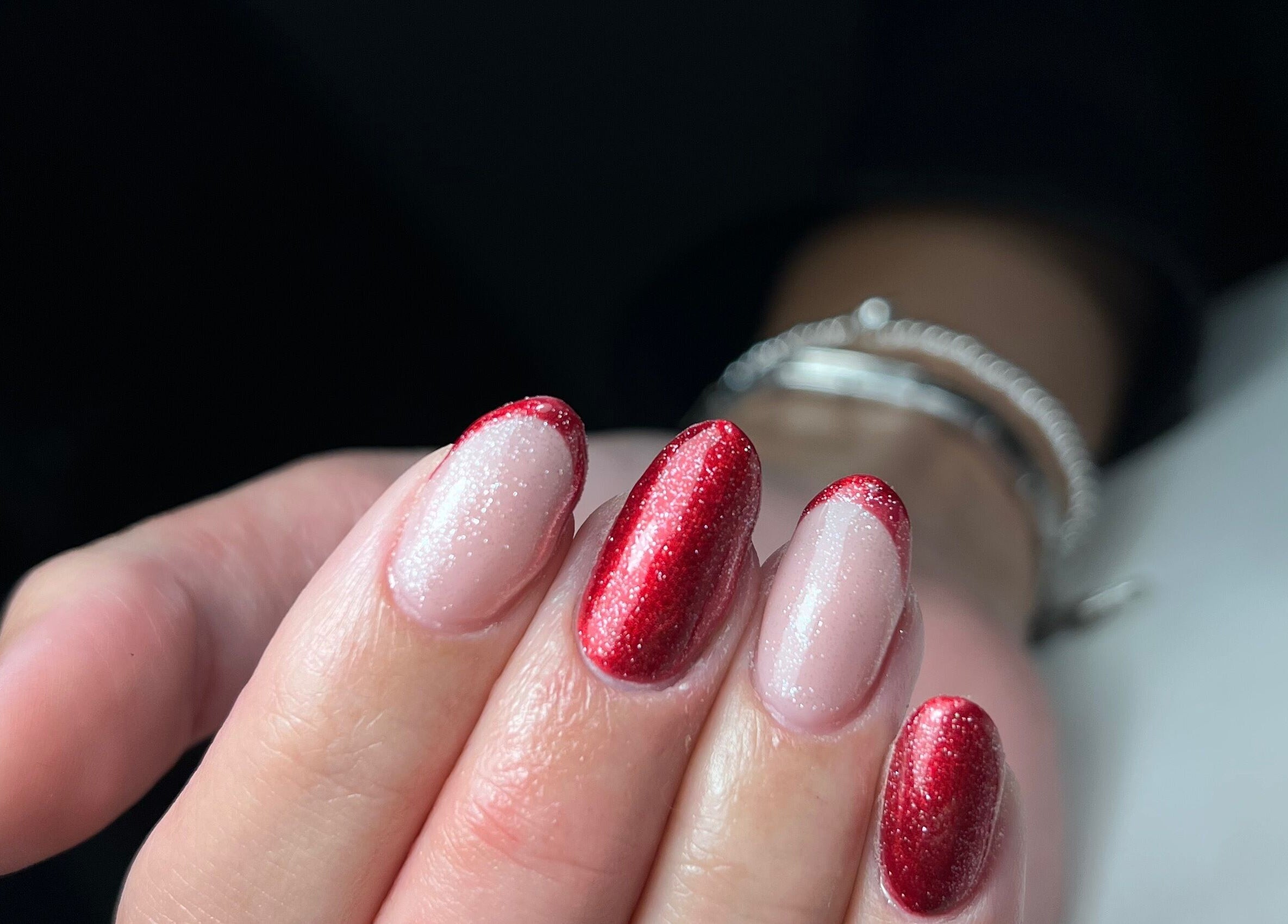 Red and pink glitter nails at Nails by Cat in Cambuslang, Scotland, GB.