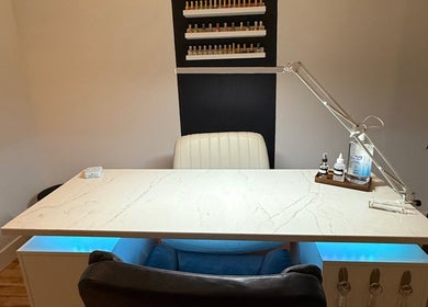 Stylish manicure station at Nails by Morgen in Hays, Kansas, US with modern decor and nail polish display.