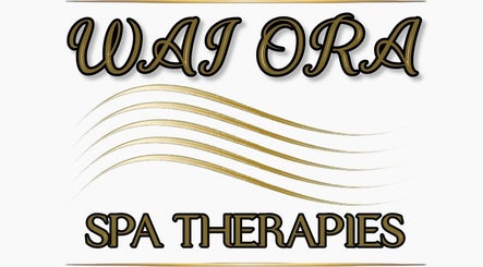Wai Ora Spa Therapies logo with golden waves, located in Pukenui, Northland Region, NZ.