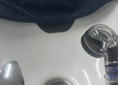 Premium sink with towel in Thee Slay Babe salon, Sandy Springs, Georgia, US.