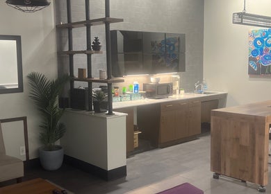 Modern salon interior at Thee Hair Slayer, Sandy Springs, Georgia, US with chic decor and seating area.