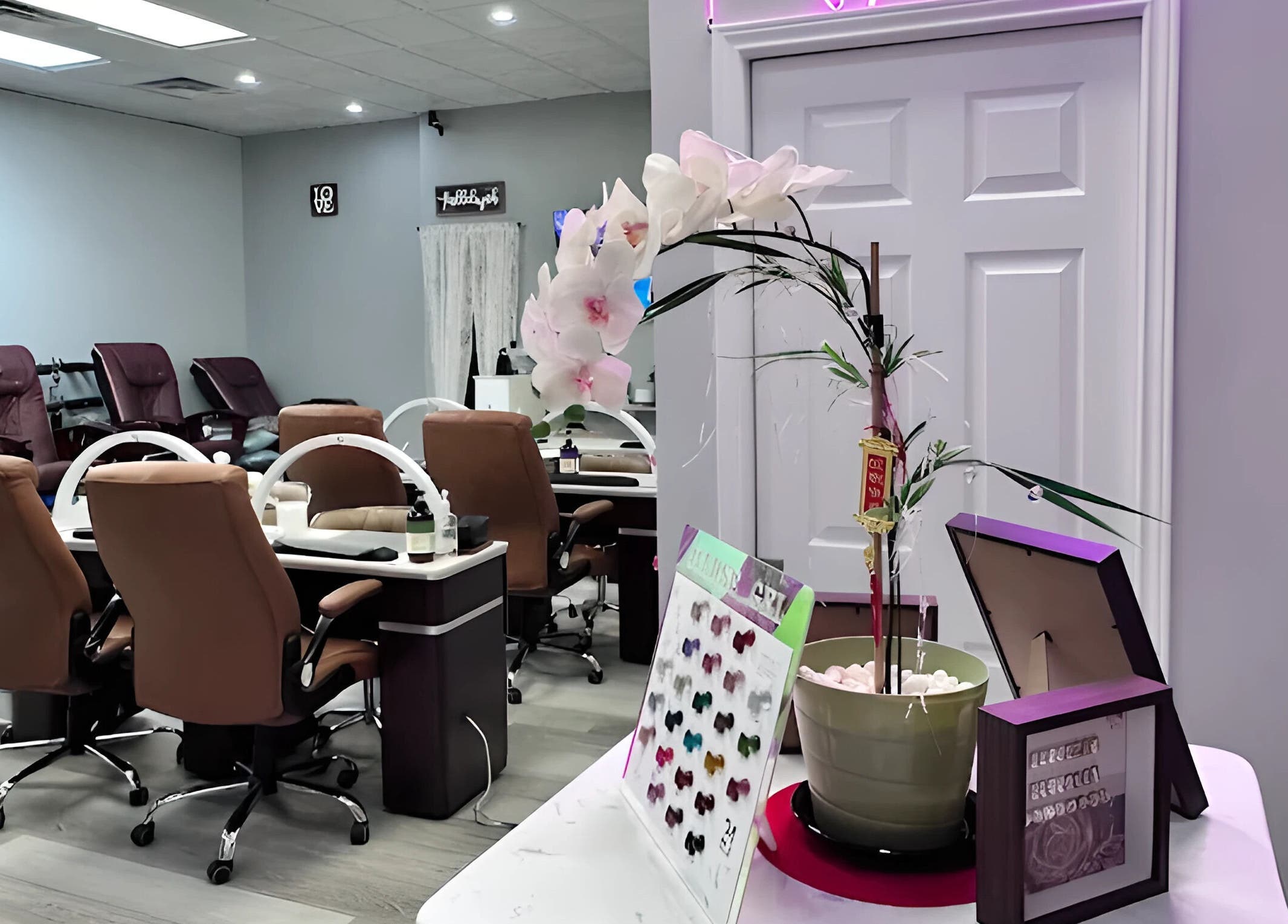 Inside view of Scarlett's Salon Spa & Nails in Austin, Texas, US featuring stylish nail stations and decor.