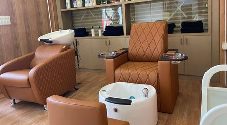 Relaxing pedicure chairs at Glam Studios Belathur, Bengaluru, Karnataka, IN offering premium wellness services.