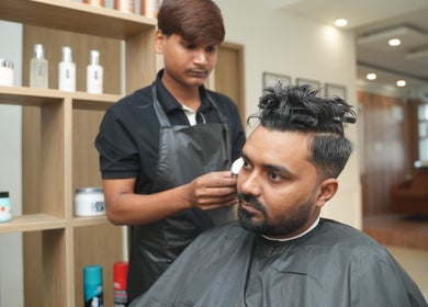 Professional hairstylist working at Glam Studios Belathur, Bengaluru, Karnataka, IN.