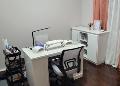 Cozy nail station at Gel Nails by Mel, Barataria, San Juan-laventille Regional Corporation, TT with tools and decor.