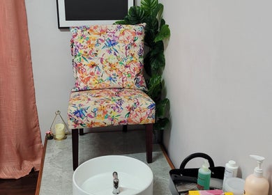 Cozy pedicure setup at Gel Nails by Mel, Barataria offers colorful seating and tranquil vibes.