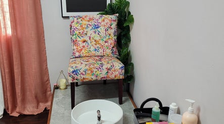 Cozy pedicure setup at Gel Nails by Mel, Barataria offers colorful seating and tranquil vibes.