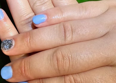 Stylishly painted nails at Elysian Beauty in Winton, Southland Region, NZ, showcasing intricate nail art.