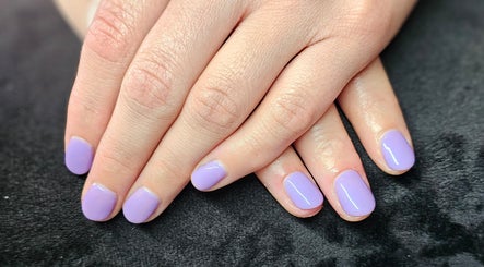 Lavender manicured nails at Elysian Beauty, Winton, Southland Region, NZ, showcasing elegance and style.