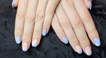 Elegant lavender nail art with floral designs at Elysian Beauty, Winton, Southland Region, NZ.
