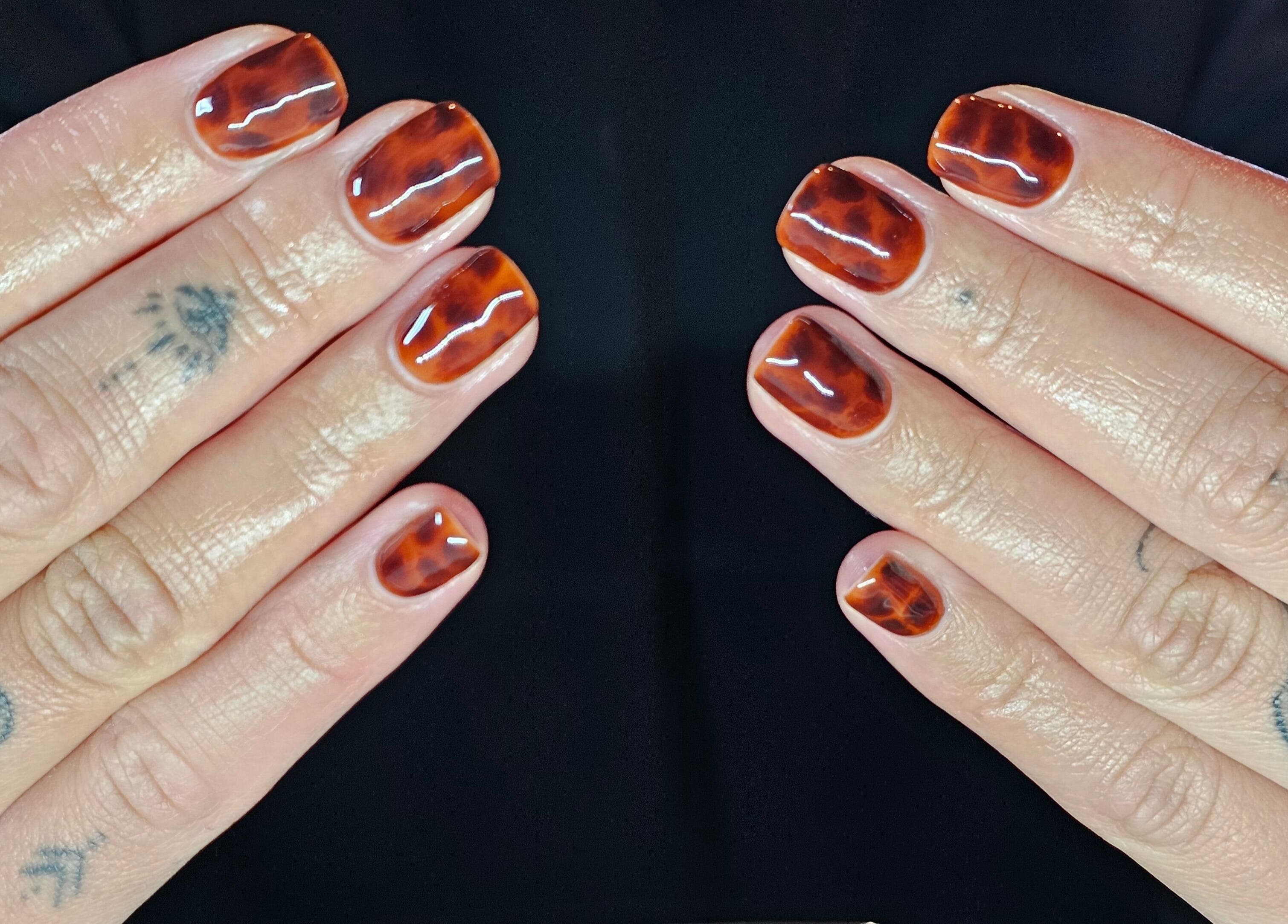 Stylish tortoise shell nails at Elysian Beauty in Winton, Southland Region, NZ. Perfect blend of elegance and flair.