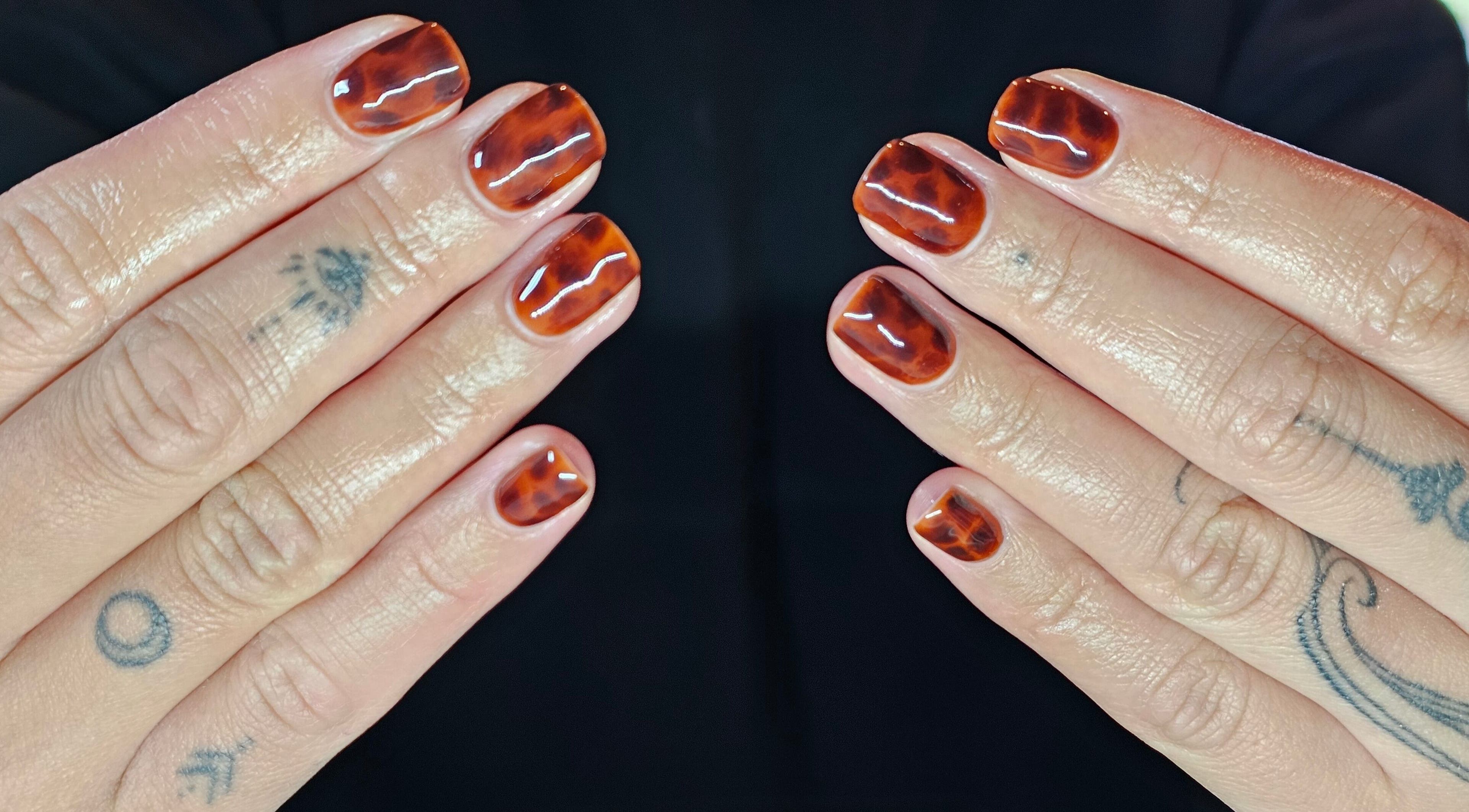 Stylish tortoise shell nails at Elysian Beauty in Winton, Southland Region, NZ. Perfect blend of elegance and flair.