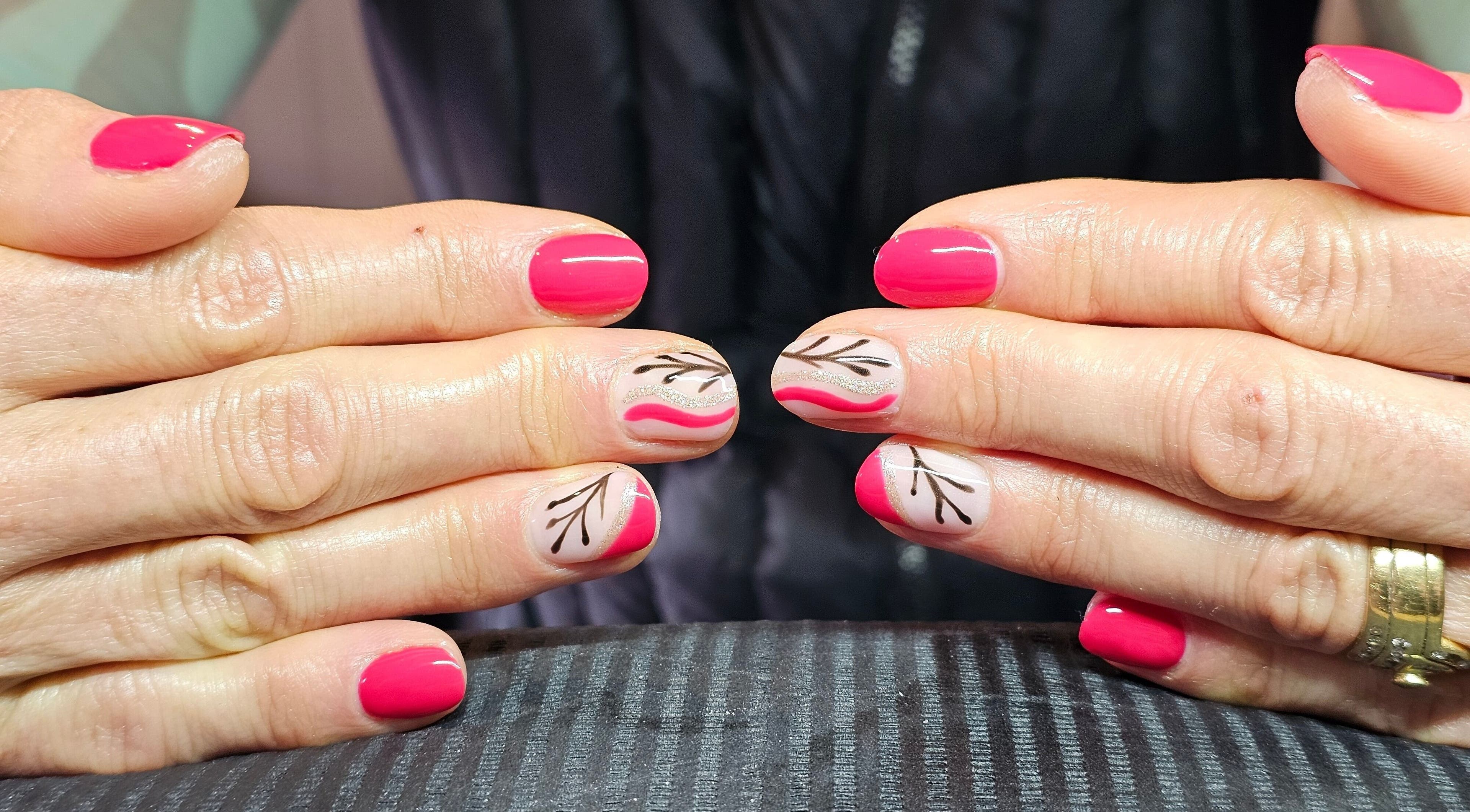 Creative floral nail art done at Elysian Beauty, Winton, Southland Region, NZ. Showcases unique pink and branch designs.