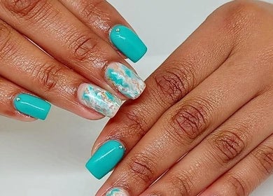 Aqua marble nail art at STYLETTE'S, George, Western Cape, ZA. Showcasing vibrant turquoise and marble design.