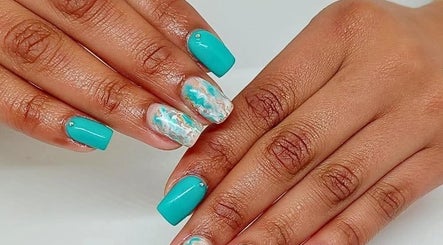 Aqua marble nail art at STYLETTE'S, George, Western Cape, ZA. Showcasing vibrant turquoise and marble design.