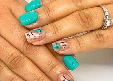 Elegant aqua and artistic nails at STYLETTE'S, George, Western Cape, ZA, showcasing intricate nail art.