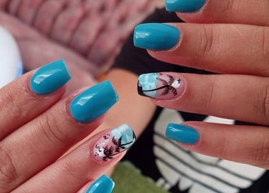 Elegant blue nails with tropical design at STYLETTE'S, George, Western Cape, ZA.