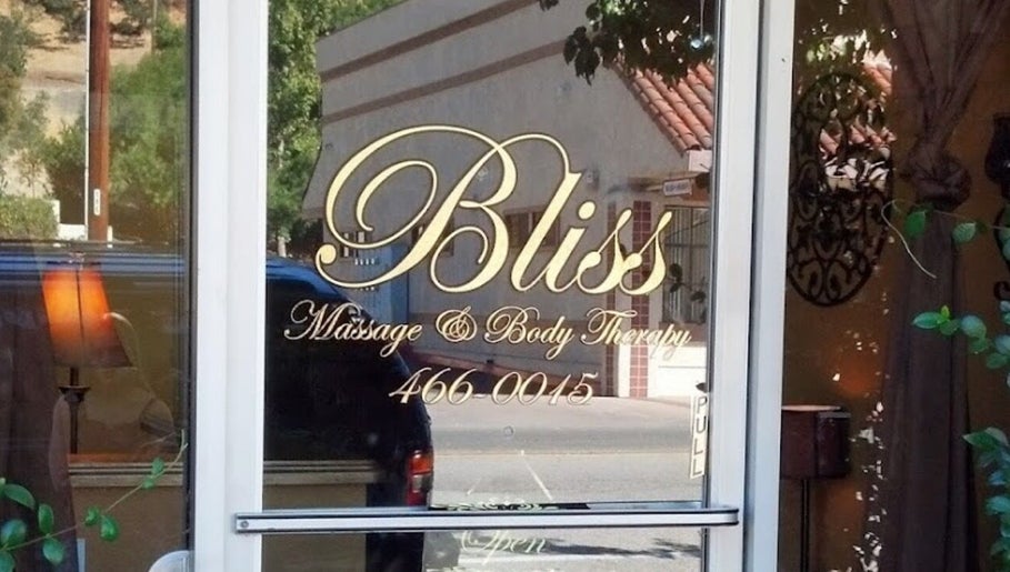 Charming entrance of 805 Skin Plug Esthetics in Atascadero, California, US with elegant glass door display.