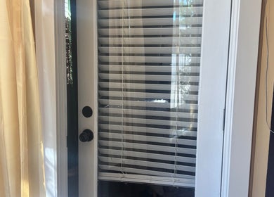 Glass door with blinds at 805 Skin Plug Esthetics in Atascadero, California, US.