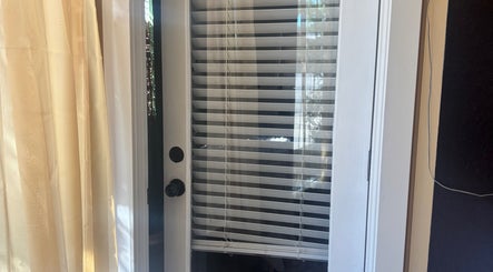 Glass door with blinds at 805 Skin Plug Esthetics in Atascadero, California, US.