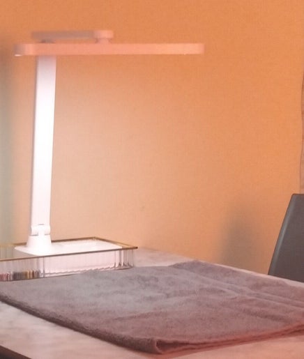 A serene manicure setup at The Polish Persona, Cape Town, Western Cape, ZA with ambient lighting.
