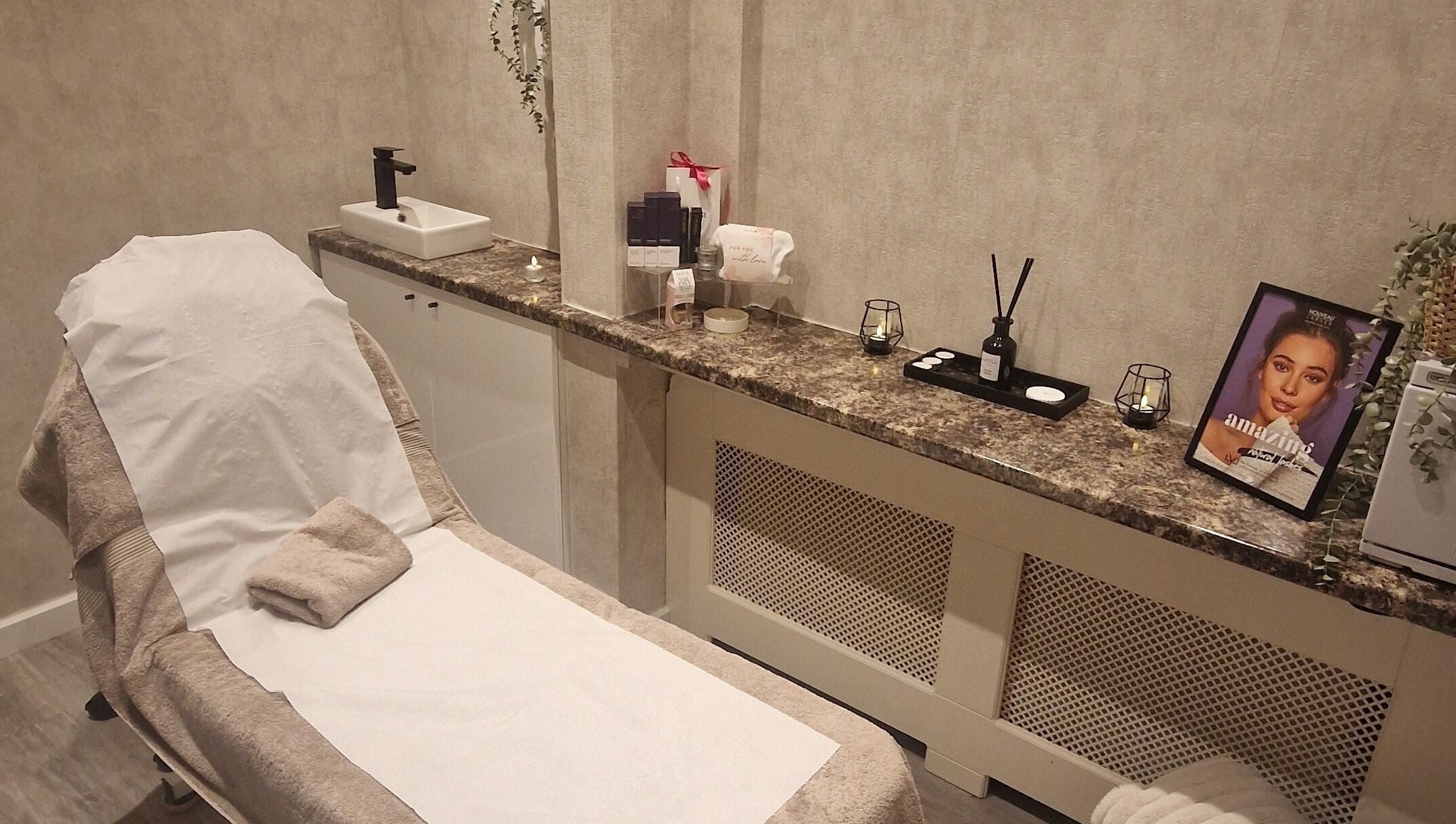 Relaxing treatment room at Beauty by Jade, Wallington, England, GB. Features a comfortable bed and calming decor.
