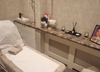 Relaxing treatment room at Beauty by Jade, Wallington, England, GB. Features a comfortable bed and calming decor.