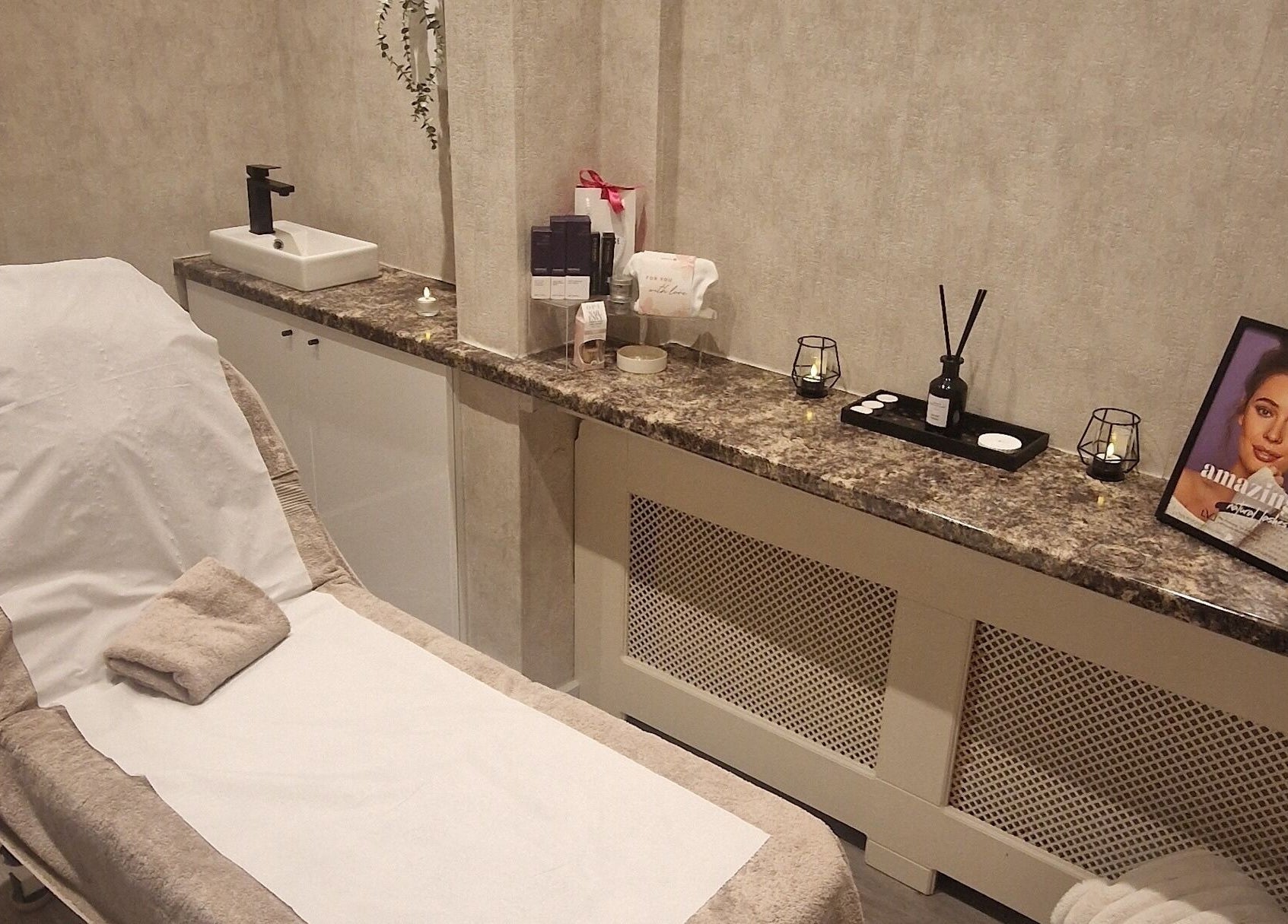 Relaxing treatment room at Beauty by Jade, Wallington, England, GB. Features a comfortable bed and calming decor.
