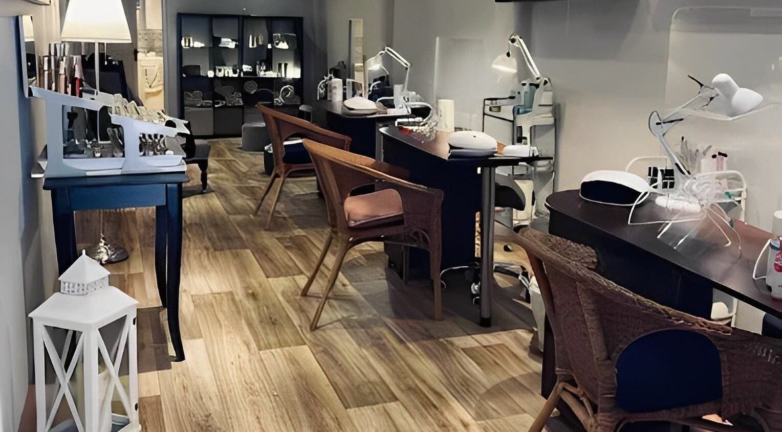Nail service area at Vanilla Beauty, Evesham, England, GB, featuring sleek design and ambient lighting.