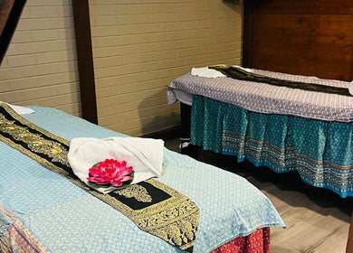 Two massage beds with intricate fabric at Peel Thai and Remedial Massage, Tamworth, New South Wales, AU.