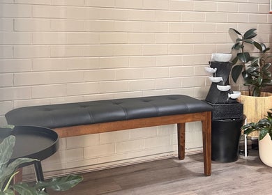 Peaceful seating area at Peel Thai and Remedial Massage, Tamworth, New South Wales, AU with plants and a water fountain.