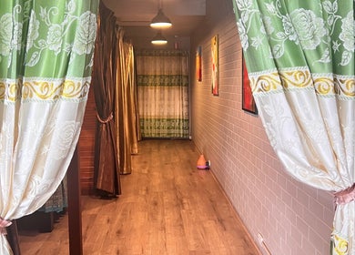 Elegant entrance with ornate curtains at Peel Thai and Remedial Massage, Tamworth, New South Wales, AU.