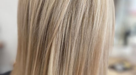 Close-up of sleek blonde hair at The Bleach Theory, Currumbin Waters, Queensland, AU.