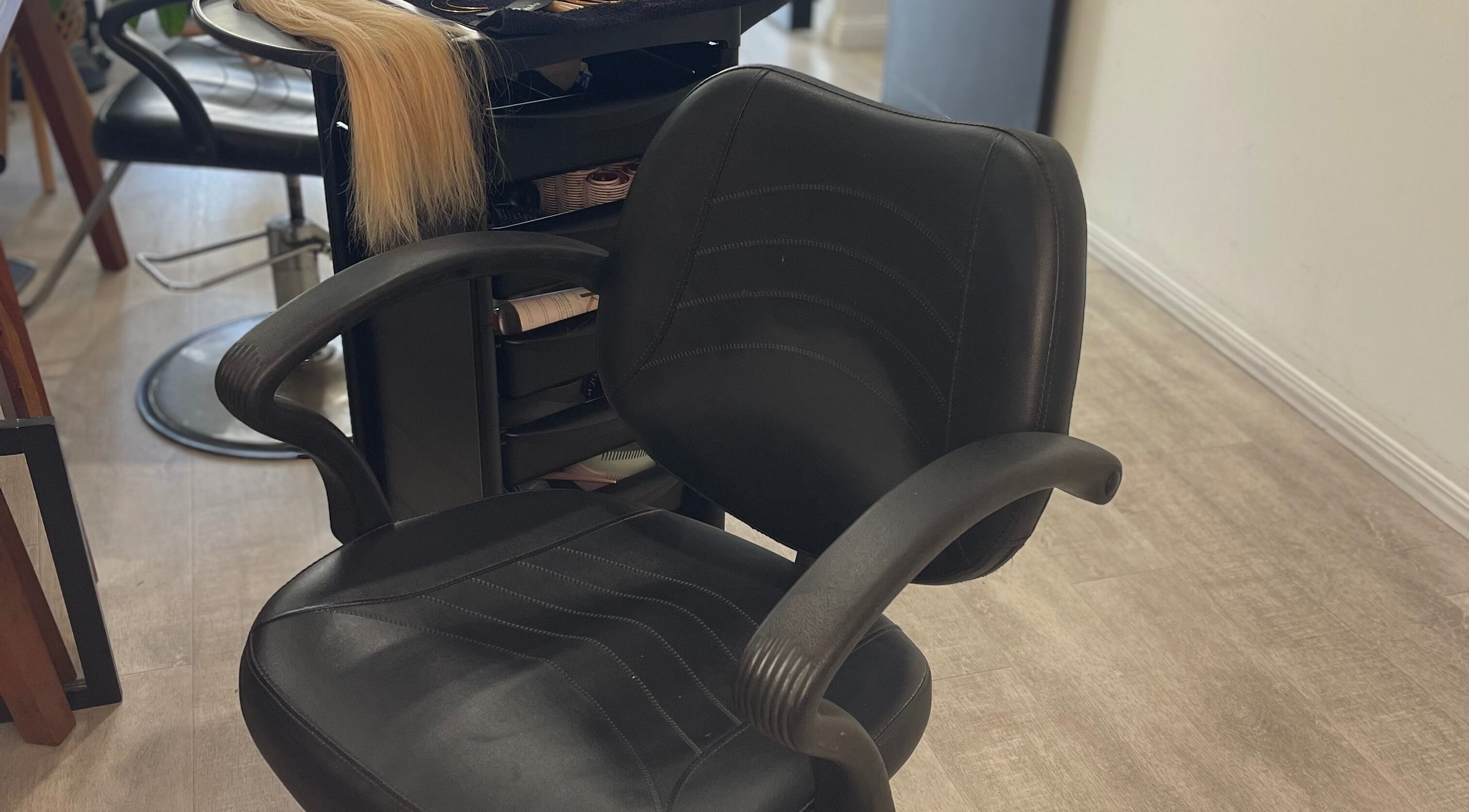 Sleek styling chair and station at The Bleach Theory, Currumbin Waters, Queensland, AU.