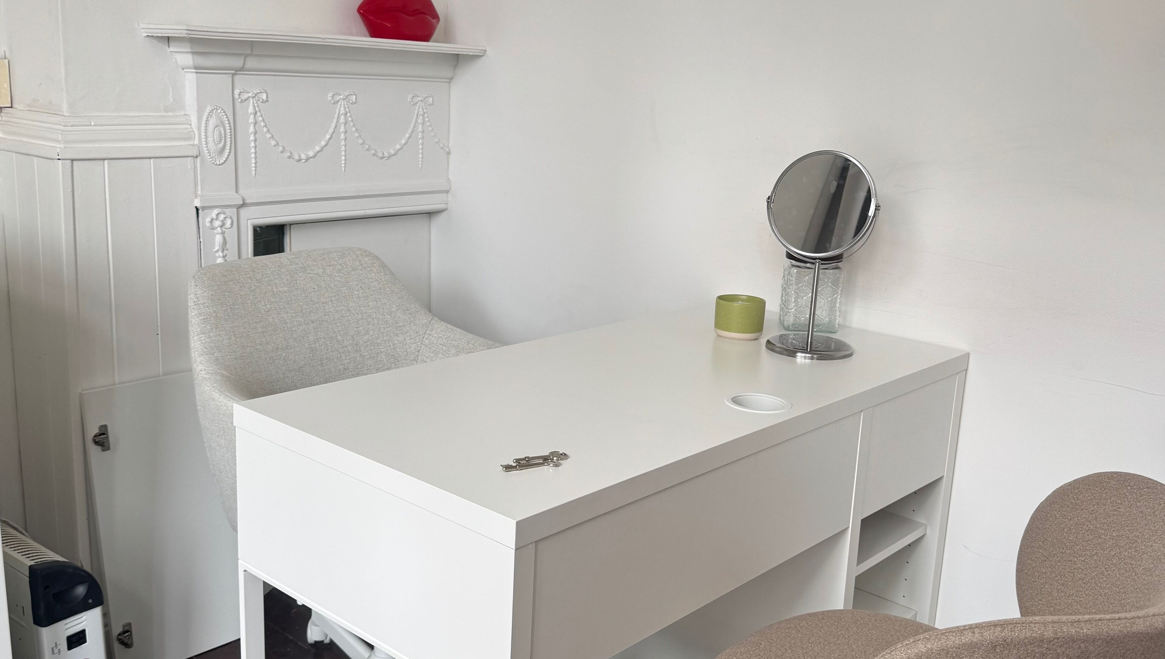 Chic beauty station at Aesthetics by Giulia, Dublin, County Dublin, IE, featuring a mirror and elegant decor.