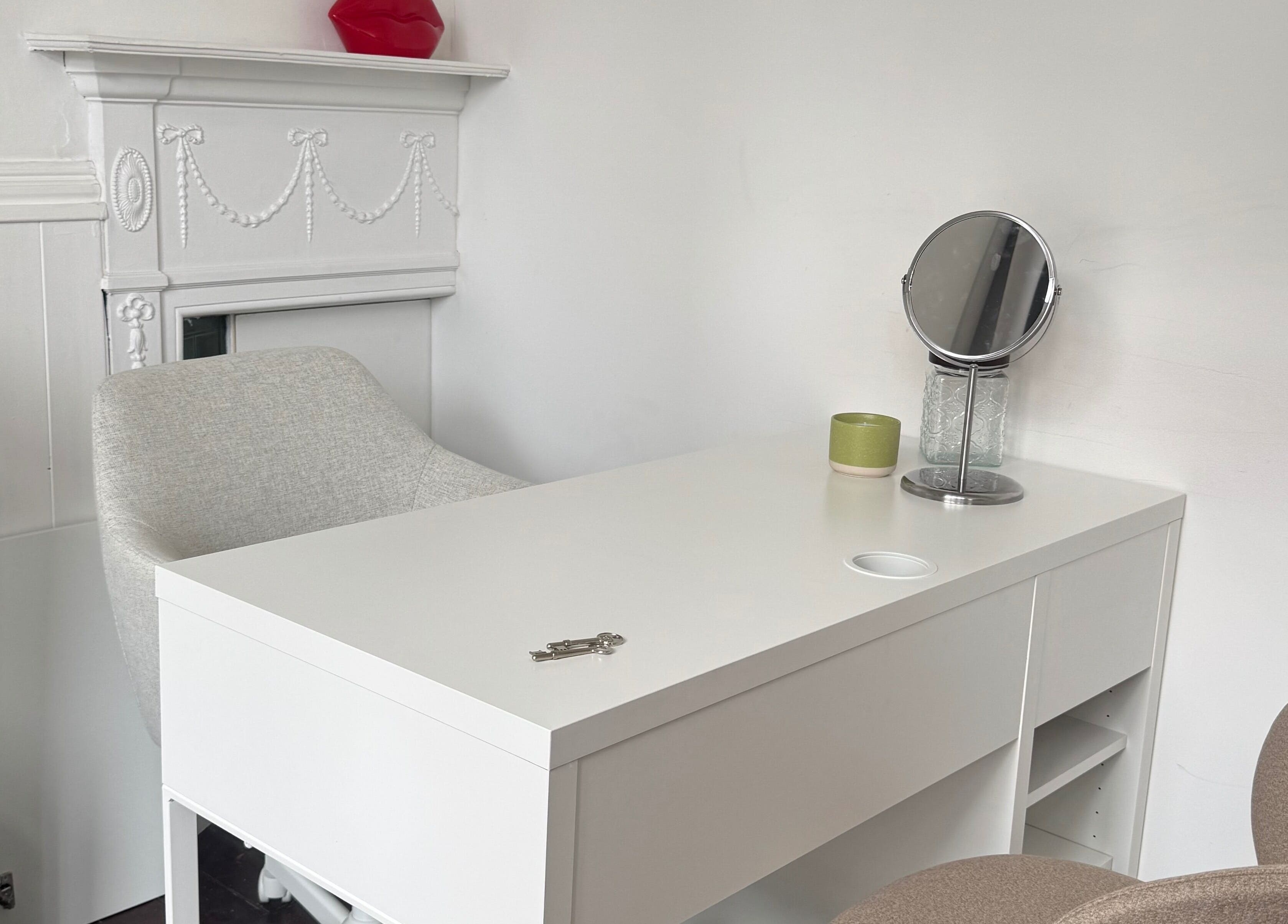 Chic beauty station at Aesthetics by Giulia, Dublin, County Dublin, IE, featuring a mirror and elegant decor.